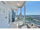 Chic balcony with stunning city views, modern light fixture, and comfortable seating arrangements at 777 N Ashley Dr # 3002, Tampa, FL 33602