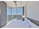 Bright bedroom with an incredible city view, neutral colors, and a modern ceiling fan at 777 N Ashley Dr # 3002, Tampa, FL 33602