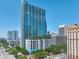 Exterior view of the building showing street view and blue glass at 777 N Ashley Dr # 3002, Tampa, FL 33602
