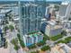 Modern high-rise building featuring sleek design, city views, and a rooftop pool at 777 N Ashley Dr # 3002, Tampa, FL 33602
