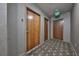 Hallway leads to unit doors and has a patterned carpet at 777 N Ashley Dr # 3002, Tampa, FL 33602