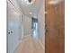 Hallway leads to living spaces and includes closet and entry doors at 777 N Ashley Dr # 3002, Tampa, FL 33602