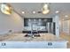 Spacious kitchen with granite countertops, stainless steel appliances, and a breakfast bar at 777 N Ashley Dr # 3002, Tampa, FL 33602