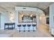 Contemporary kitchen with stainless appliances and a bar with marble countertops at 777 N Ashley Dr # 3002, Tampa, FL 33602