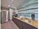 The kitchenette has stainless steel appliances and granite countertops at 777 N Ashley Dr # 3002, Tampa, FL 33602