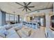 Spacious living room with an open floor plan with city and water views at 777 N Ashley Dr # 3002, Tampa, FL 33602