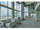 Spacious lounge area with comfortable seating, large windows, and city views at 777 N Ashley Dr # 3002, Tampa, FL 33602