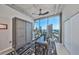 Bright office features a murphy bed and a large window with a city view at 777 N Ashley Dr # 3002, Tampa, FL 33602
