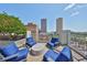 Rooftop deck with comfortable seating and stunning city views at 777 N Ashley Dr # 3002, Tampa, FL 33602