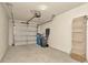 Spacious garage with garage door, room for storage and car parking at 8013 Savannah Sunset Ln, Tampa, FL 33615