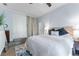 A charming bedroom with light blue walls and luxury vinyl flooring at 807 W Braddock St, Tampa, FL 33603