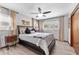 Bedroom showcasing neutral walls, wooden flooring, and a large window at 807 W Braddock St, Tampa, FL 33603