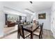 Dining room with a modern light fixture and access to an adjacent living space at 807 W Braddock St, Tampa, FL 33603
