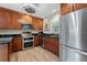 Well-equipped kitchen featuring stainless steel appliances, ample counter space, and modern cabinetry at 807 W Braddock St, Tampa, FL 33603