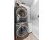 Efficient laundry area with stacked washer and dryer and ample storage space at 807 W Braddock St, Tampa, FL 33603