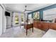 Bright office space with custom built-ins, wooden desk and an exterior view at 807 W Braddock St, Tampa, FL 33603
