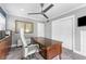 Well-lit office with large wooden desk and ample storage space at 807 W Braddock St, Tampa, FL 33603