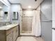 Modern renovated bathroom with elegant vanity, tiling, and walk-in shower at 810 Island Walk Dr # 810, Tampa, FL 33602