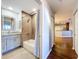 Bathroom and hallway to other areas of home with neutral colors at 810 Island Walk Dr # 810, Tampa, FL 33602