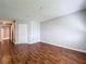 Spacious bedroom features wood-look floors and convenient access to the hallway at 810 Island Walk Dr # 810, Tampa, FL 33602