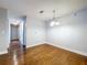 Dining room features hardwood floors, modern lighting, and a layout perfect for entertaining guests at 810 Island Walk Dr # 810, Tampa, FL 33602