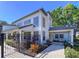 Elegant building with well-manicured landscaping and iron gate entrance at 810 Island Walk Dr # 810, Tampa, FL 33602