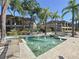 Picturesque fountain area surrounded by lush greenery and charming community buildings at 810 Island Walk Dr # 810, Tampa, FL 33602