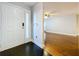 Inviting foyer with views of the living area, showcasing hardwood floors and ample natural light at 810 Island Walk Dr # 810, Tampa, FL 33602