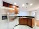 Kitchen with stainless steel appliances and stone countertops at 810 Island Walk Dr # 810, Tampa, FL 33602