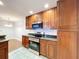 Kitchen features granite countertops, wood cabinets and stainless steel appliances at 810 Island Walk Dr # 810, Tampa, FL 33602