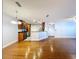 Open concept living room and kitchen with hardwood floors and stainless steel appliances at 810 Island Walk Dr # 810, Tampa, FL 33602