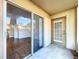 Cozy patio with sliding glass door, showcasing indoor-outdoor living at 810 Island Walk Dr # 810, Tampa, FL 33602