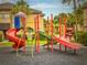 Community playground area with slides, climbing structures, and play equipment at 810 Island Walk Dr # 810, Tampa, FL 33602