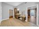 Bathroom featuring a vanity with granite countertops and an adjacent walk-in closet for convenient storage at 915 Bayshore Dr, Tarpon Springs, FL 34689