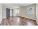 Spacious bedroom with hardwood floors and plenty of natural light, creating a bright and airy atmosphere at 915 Bayshore Dr, Tarpon Springs, FL 34689