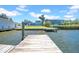 A view from the dock overlooking the lawn and gorgeous home at 915 Bayshore Dr, Tarpon Springs, FL 34689