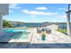 Backyard pool, spa, and patio with waterfront views, perfect for outdoor living and entertaining at 915 Bayshore Dr, Tarpon Springs, FL 34689