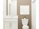Cozy bathroom featuring a single vanity with a white cabinet and a shower/tub combo at 10274 Gentle Rain Dr, Land O Lakes, FL 34638