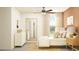 Charming bedroom with a neutral color palette, a decorative mirror, and a comfortable bed at 10274 Gentle Rain Dr, Land O Lakes, FL 34638