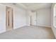 Bedroom offers carpet and a view of an ensuite bathroom at 11834 Mile Marsh Dr, Riverview, FL 33569
