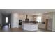 Spacious open-concept kitchen with an island and modern stainless steel appliances at 11834 Mile Marsh Dr, Riverview, FL 33569