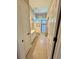 A well-lit bathroom with a walk-in shower and single vanity and neutral color scheme at 1201 Ventana Dr, Sun City Center, FL 33573