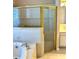 Luxurious soaking tub with a gold-trimmed shower in this elegant bathroom, providing a lavish experience at 1201 Ventana Dr, Sun City Center, FL 33573