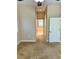 A view through the main bedroom into the main bathroom suite at 1201 Ventana Dr, Sun City Center, FL 33573