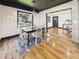 Charming dining room with an open view of the living room, perfect for modern living at 1221 E Emma St, Tampa, FL 33603