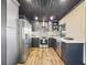 Modern kitchen featuring stainless steel appliances, sleek cabinetry, and stylish countertops at 1221 E Emma St, Tampa, FL 33603