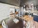 Open-concept layout with seamless transitions between dining, living, and kitchen areas at 1221 E Emma St, Tampa, FL 33603