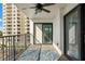 Balcony with stylish ceiling fan, a beautiful blue rug, and a great view at 1230 Gulf Blvd # 508, Clearwater Beach, FL 33767