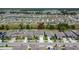 Beautiful view of community featuring home with manicured lawn and decorative shutters at 13234 Great Plains Dr, Riverview, FL 33579
