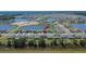 Beautiful aerial of lake community neighborhood with an arrow pointing to the property at 13234 Great Plains Dr, Riverview, FL 33579